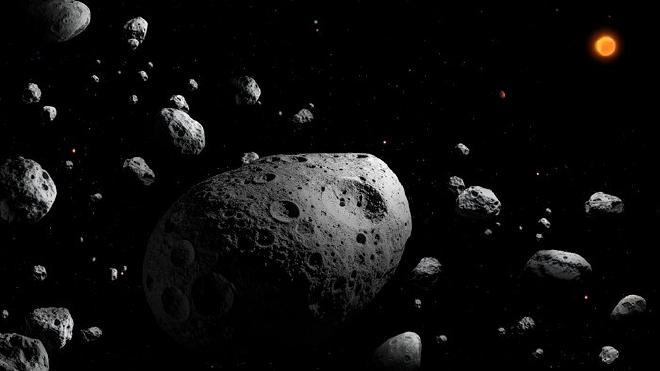 Esta ilustración artística representa a 2025 MN45, el asteroide de rotación más rápida, con un diámetro de más de 500 metros, que no fue descubierto por los científicos&hellip; hasta ahora. El asteroide se muestra rodeado de muchos otros asteroides, lo que indica su ubicación dentro del cinturón principal de asteroides. El Sol y Júpiter se muestran a lo lejos. 2025 MN45 tiene 710 metros (0,44 millas) de diámetro y completa una rotación cada 1,88 minutos. El descubrimiento se realizó utilizando datos del Observatorio Vera C. Rubin de la NSF-DOE, financiado conjuntamente por la Fundación Nacional de Ciencias de EE. UU. y la Oficina de Ciencia del **Departamento de Energía de EE. UU.. Crédito de la imagen: Observatorio Vera C. Rubin de la NSF-DOE/NOIRLab/SLAC/AURA/P. Marenfeld